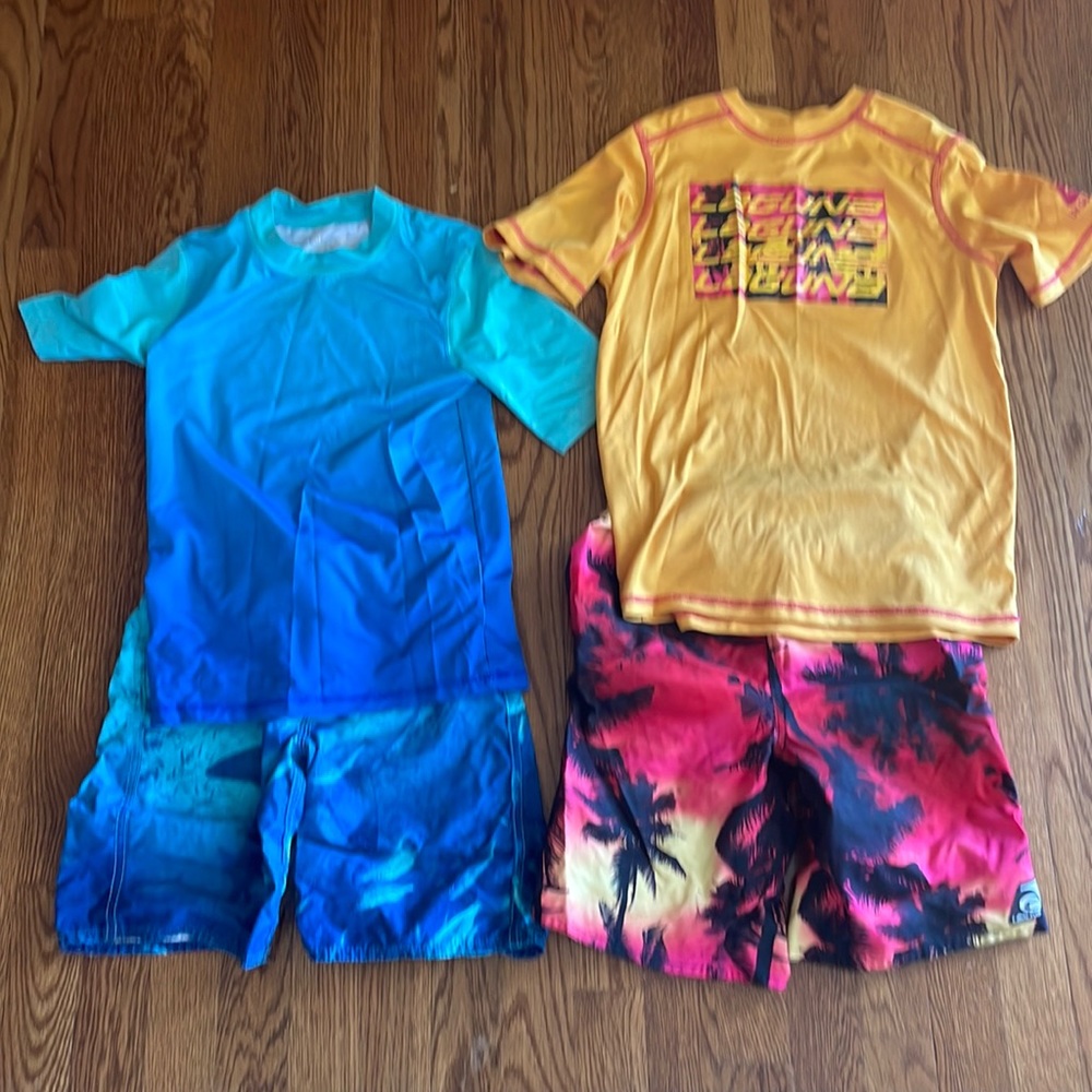 Swim trunks and shirts. 2 sets of boys swim clothes. Size 8 and 10/12.